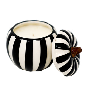 The Ceramic Large Black Line Pumpkin Candle features black and white stripes and a matching removable lid—ideal as a unique, stylish decor piece or custom candle.