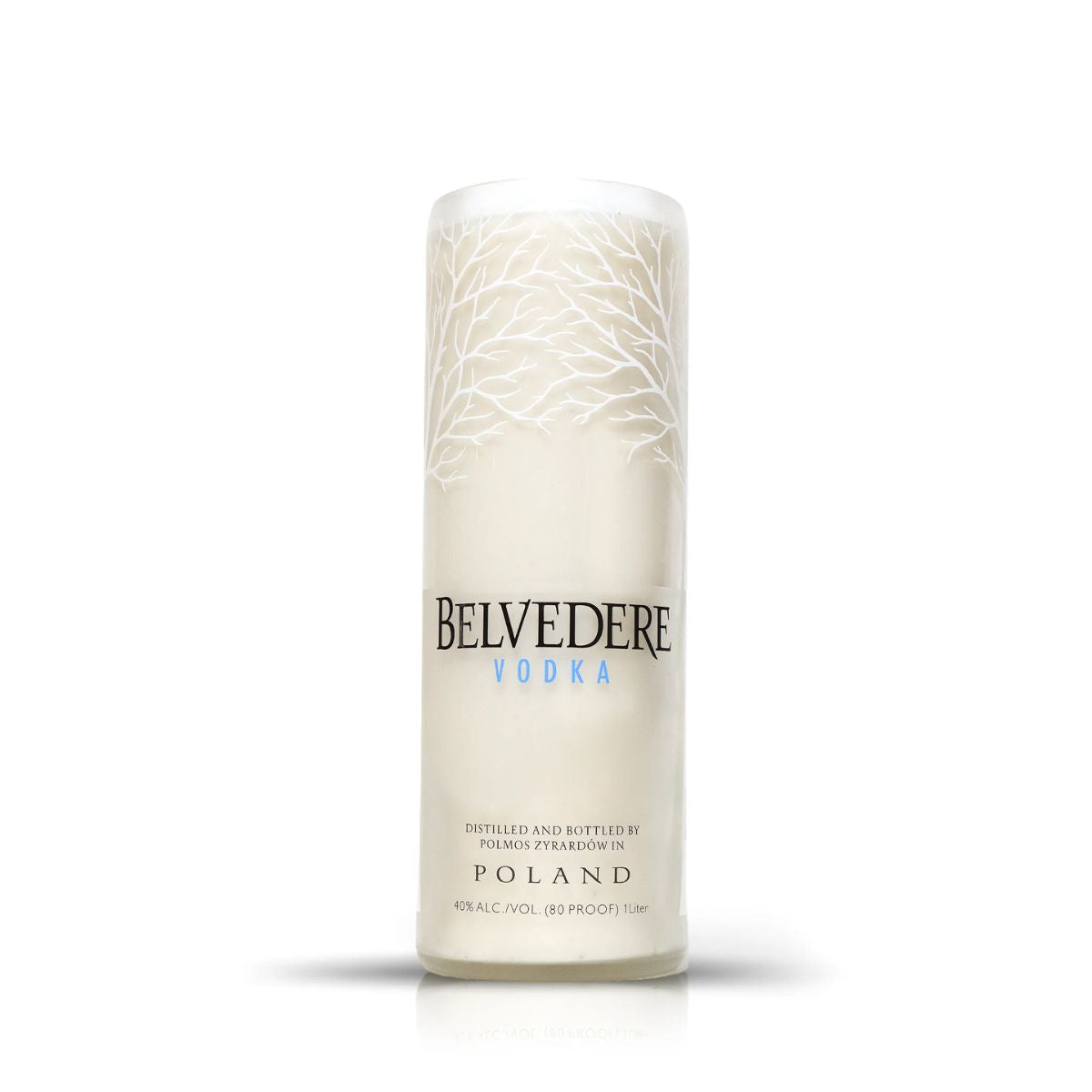 The Recycled Belvedere Vodka Candle, crafted from a signature frosted bottle with white tree branches and clear branding, stands upright against a plain white background—an eco-friendly décor choice.