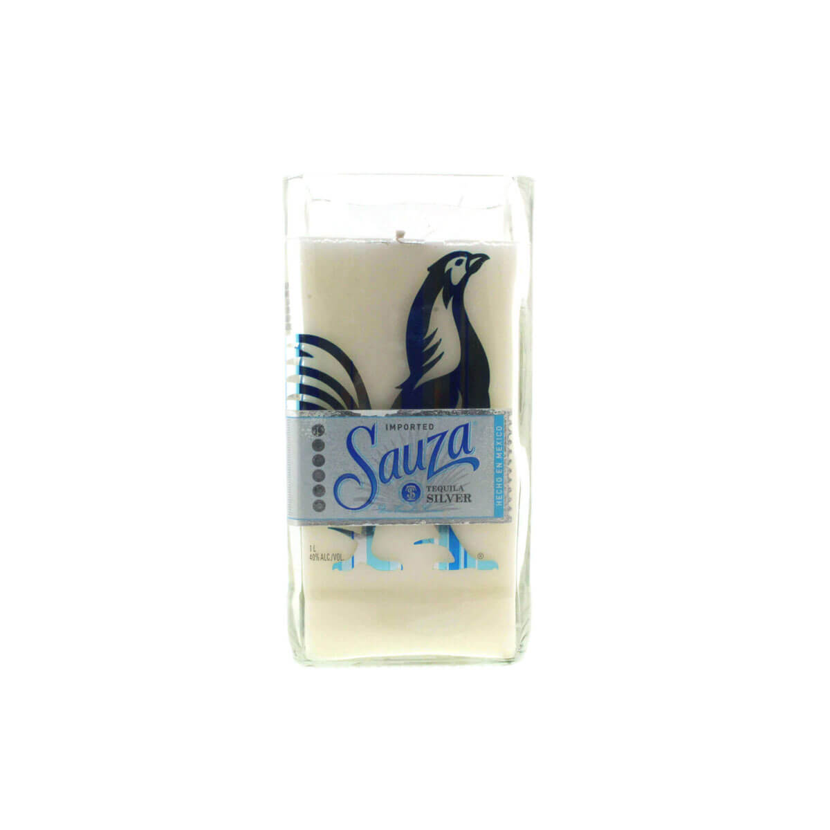 The Recycled Sauza Silver Tequila Candle is a white soy candle in a clear glass holder with a blue rooster and "Sauza Tequila Silver" label—perfect for tequila lovers.