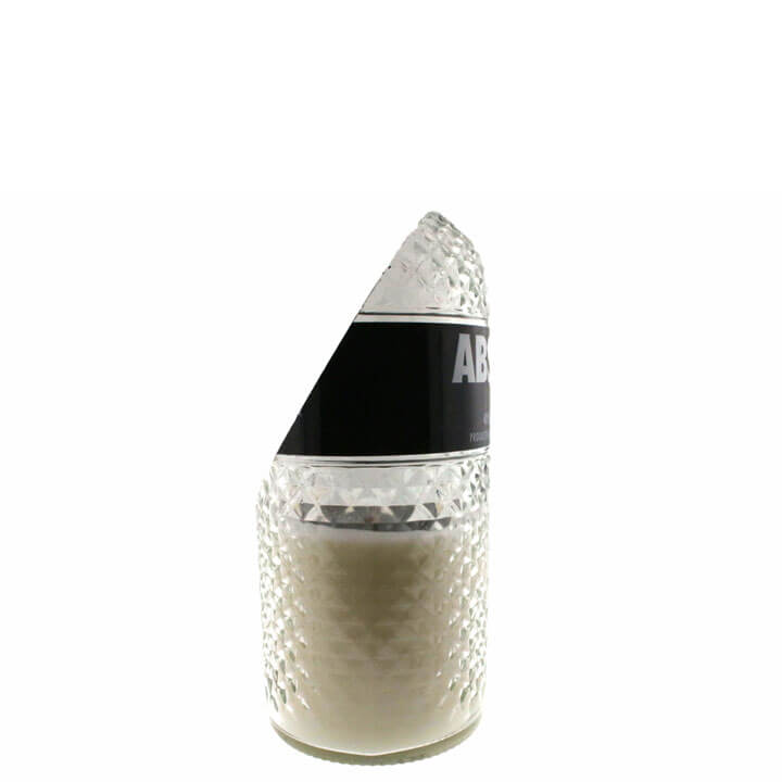 A crystal-cut Absolut bottle with a slanted top, partially filled with an all natural soy blend and finished with a black label—this is the Recycled Vodka Candle, hand poured for a unique touch.