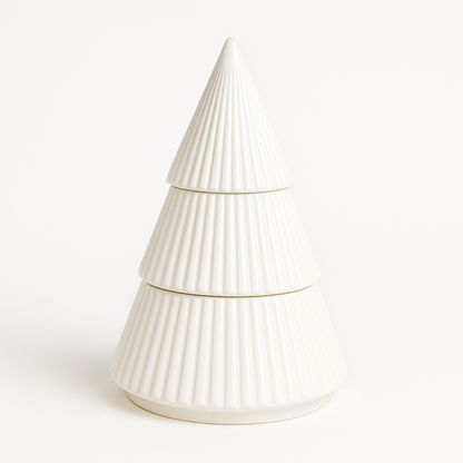 The Ceramic Tree Candle features a white, ribbed, cone-shaped design with three stackable sections resembling a stylized Christmas tree—perfect for adding holiday charm. Shown on a plain white background.