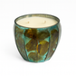 The Aqua Glow Candle features green and brown glass, two wicks, off-white wax, and a luxurious scent, shown on a white background.