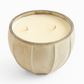 The Frosted Pearl Candle features a creamy white, hand-poured soy wax with two wicks in a beige ceramic container, shown against a white background.