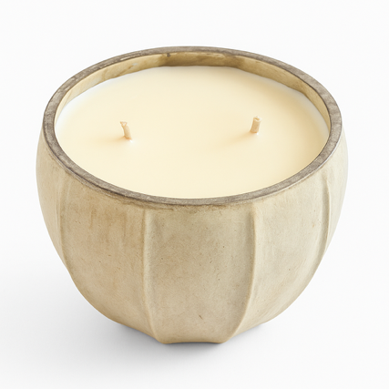 The Frosted Pearl Candle features a creamy white, hand-poured soy wax with two wicks in a beige ceramic container, shown against a white background.