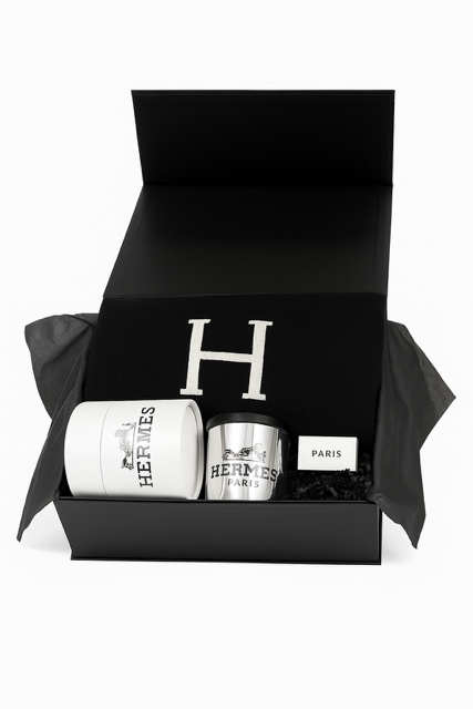 The Designer Paris Gift Set includes a black Hermes cotton throw, white Hermes candle, silver cup, and small "Paris" box in a sleek black box—ideal for luxury gifts or custom baskets.