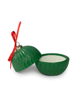 The Christmas Ornament Candle features a green container with a red ribbon; its lid is off, showing the white coconut apricot wax candle inside.
