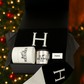 The Designer Paris Gift Set includes a black gift box with a mug, candle, soap, and scarf, displayed before a festive Christmas tree. Ideal for holiday gifting or adding to custom baskets for an elegant touch.