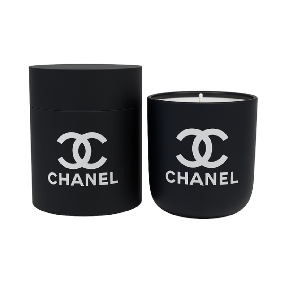 The Black Ceramic Designer Candle sits beside its matching cylindrical container, both in black ceramic and decorated with the white Chanel logo.
