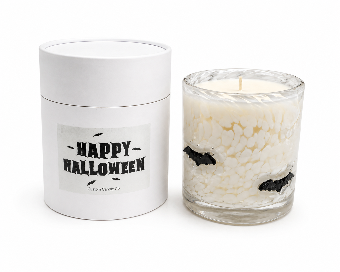 Bat Halloween candle beside its Happy Halloween gift tube
