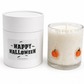 Pumpkin Halloween candle beside its Happy Halloween gift tube