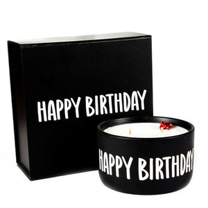 The "Happy Birthday" Candle Gift Box Set features a black candle container and matching gift box, both with "HAPPY BIRTHDAY" in bold white letters.