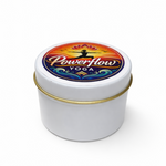 The Powerflow Yoga - Promotional Tin Candle comes in a round white tin with a gold rim and colorful label, making it an ideal keepsake or promotional item, shown here against a plain white background.