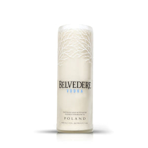 The Recycled Belvedere Vodka Candle, crafted from a signature frosted bottle with white tree branches and clear branding, stands upright against a plain white background—an eco-friendly décor choice.