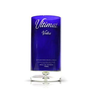 The Recycled Ultimat Vodka Candle is crafted from a blue glass Ultimat Vodka bottle (750ml, 40% ABV), making it a unique, eco-friendly artisanal candle perfect for adding a recycled touch to your space.