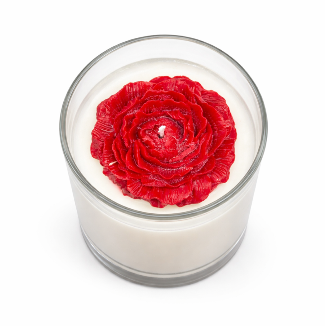 The Rose Blossom Candle is a handcrafted, all-natural soy candle in white, topped with a red wax rose and presented in a glass container.