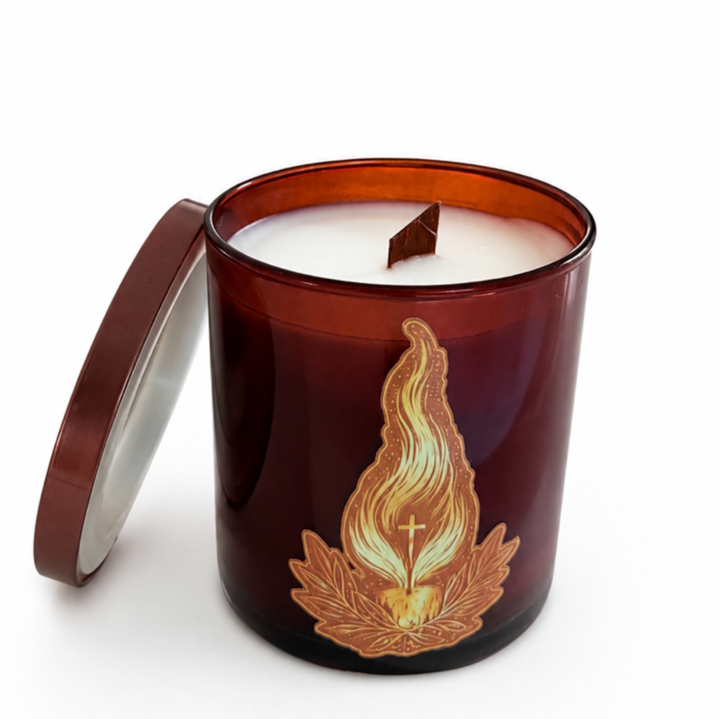 Candle in a decorative amber jar with a flame design on a white background