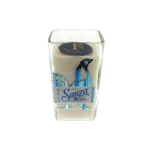 The Recycled Sauza Silver Tequila Candle is a square glass holder made from a Sauza Silver bottle, featuring a blue agave plant and bird on the label—ideal for showcasing your favorite custom candle.