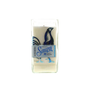 The Recycled Sauza Silver Tequila Candle is a white soy candle in a clear glass holder with a blue rooster and "Sauza Tequila Silver" label—perfect for tequila lovers.