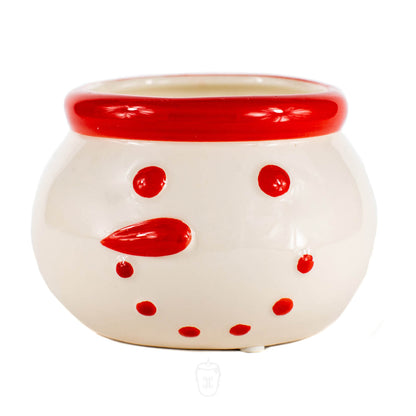 The Ceramic Snowman Holiday Candles feature a white ceramic bowl with red accents, ideal for holding holiday candles. Photographed on a white background.