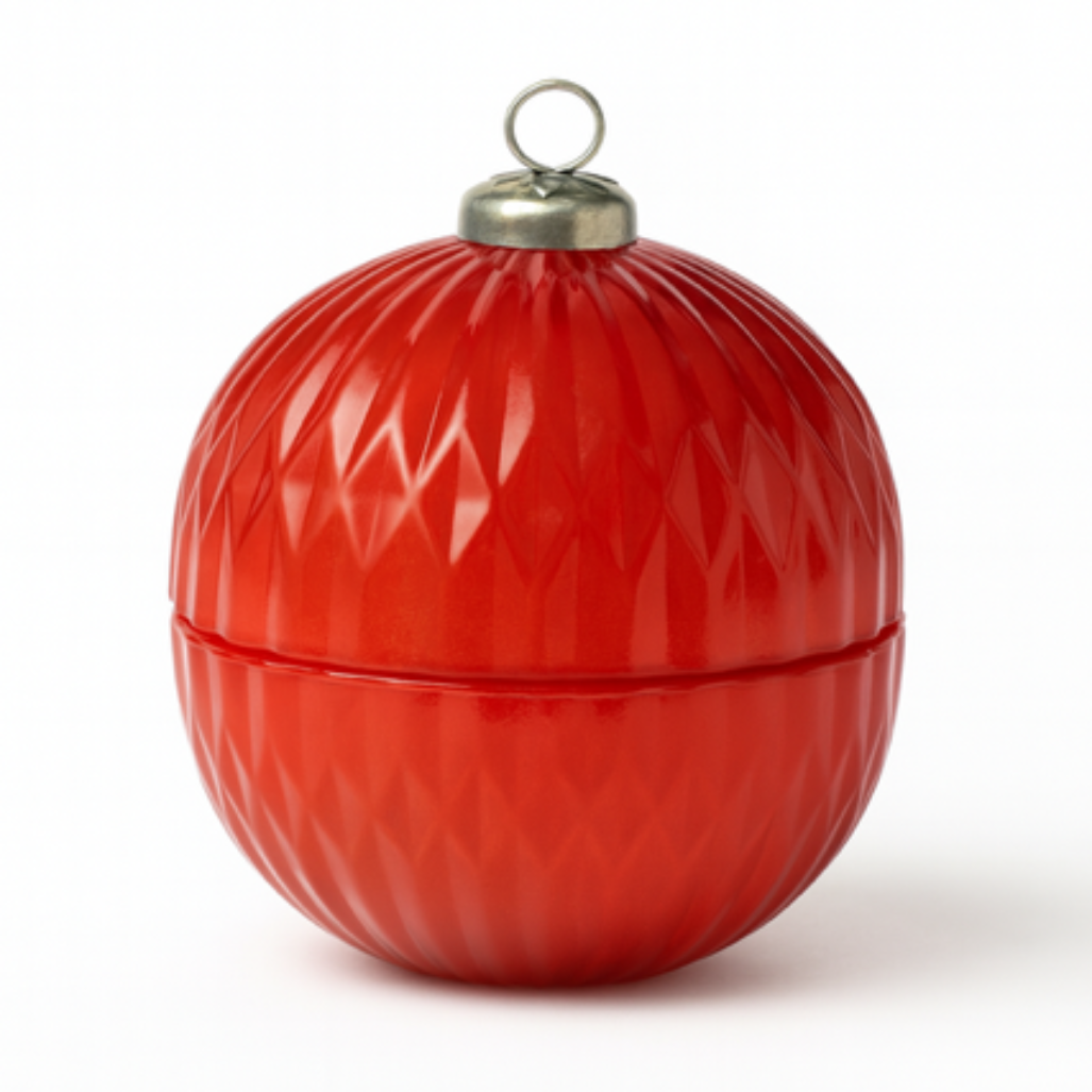 The Red Ornament Candle is a red, round candle with a diamond texture and a silver looped cap—ideal for custom holiday décor—shown isolated on white.