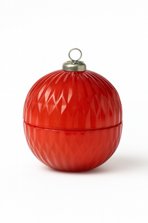 The Red Ornament Candle is a red, round candle with a diamond texture and a silver looped cap—ideal for custom holiday décor—shown isolated on white.
