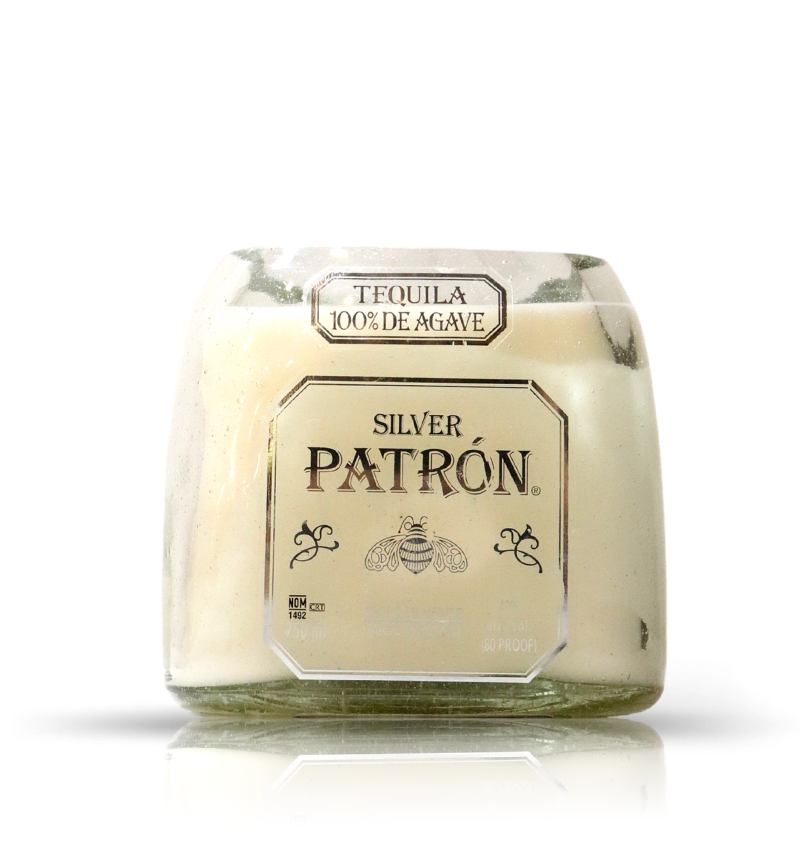 A Recycled Patron Silver Tequila Candle with the word paton on it.