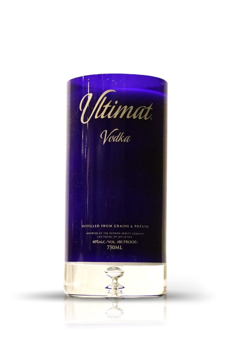 A blue candle with the words Recycled Vodka Candle - Ultimat on it.