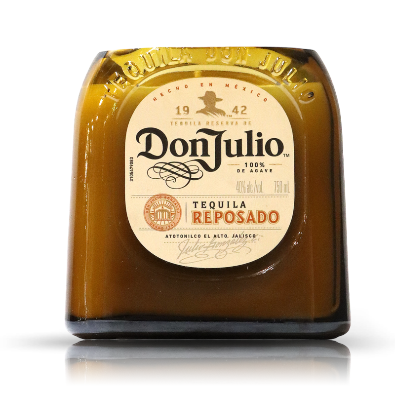 A bottle of Recycled Don Julio Reposado Tequila Candle on a white background.