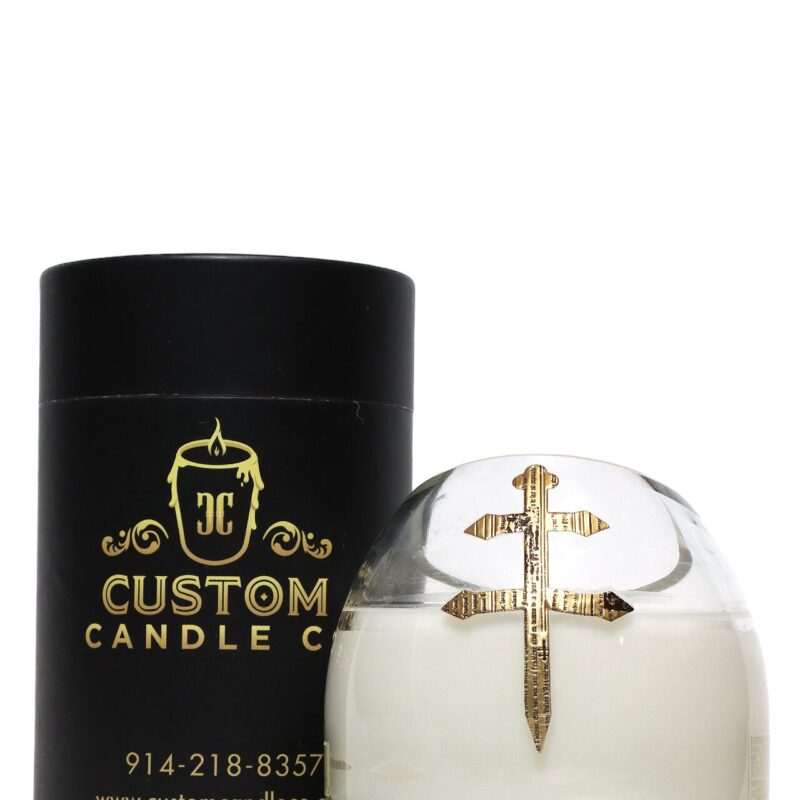 A Recycled D'usse VSOP Cognac candle with a gold logo.