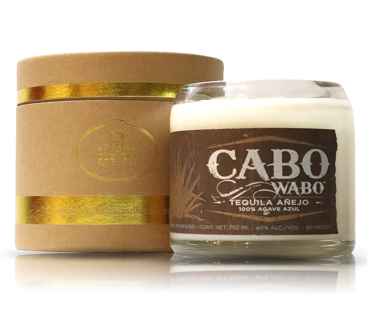 A Recycled Cabo Wabo Anejo Tequila Candle with a gold box next to it.