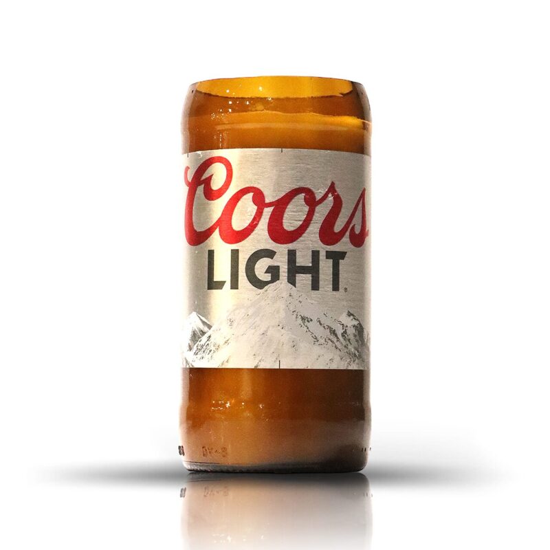A Recycled Coors Light Can Candle on a white surface.