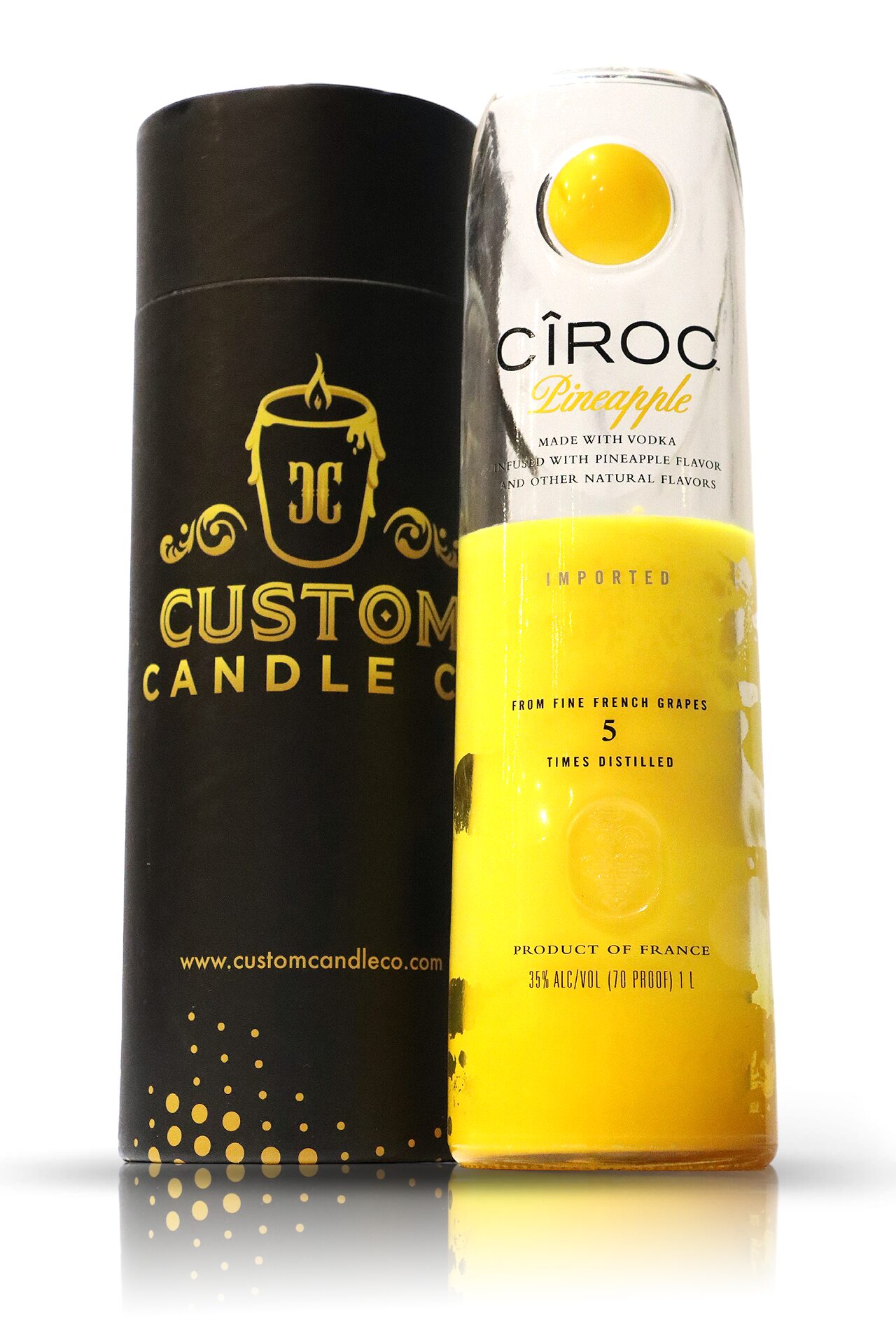 A black and yellow Recycled Vodka Candle - Ciroc Pineapple.