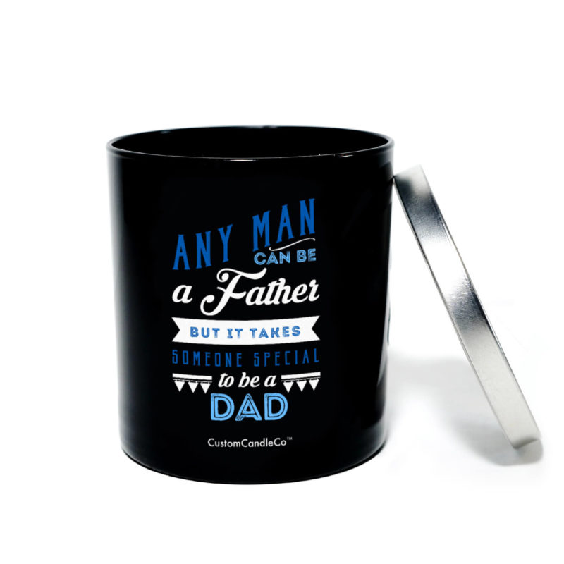 black tumbler with silver top that says Any Man can be a father