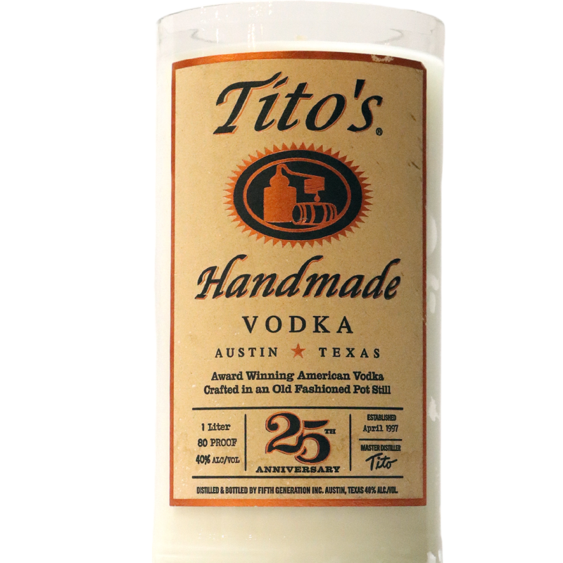 Recycled Tito's handmade vodka & tequila flat cut candle.
Product Name: Recycled Flat Cut Vodka Empty Bottle - Titos 
Revised Sentence: Recycled Flat Cut Vodka Empty Bottle - Titos handmade vodka & tequila candle.