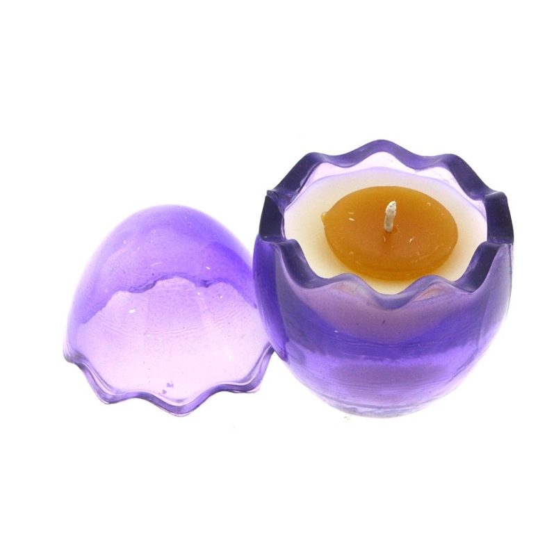 A Purple Glass Easter Egg white wax and Yolk candle holder top view.