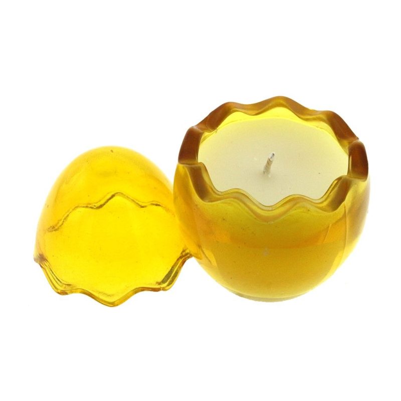 A Yellow Glass Easter Egg shaped candle with a yellow lid and made from yellow glass.