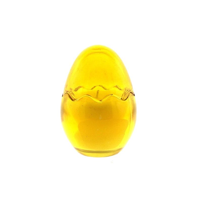 A Yellow Glass Easter Egg candle on a white background.