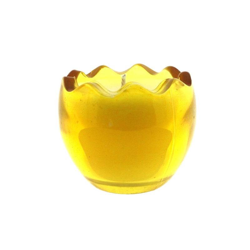 The Yellow Glass Easter Egg candle on a white background (side view).
