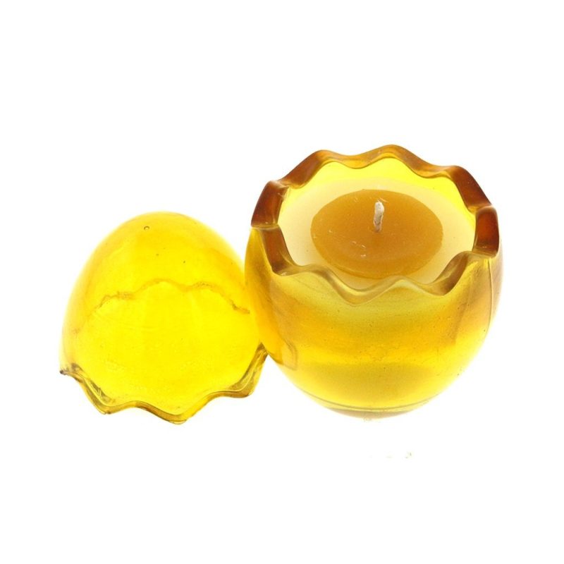 A Yellow Glass Easter Egg candle w/ white and yellow wax for the yolk.