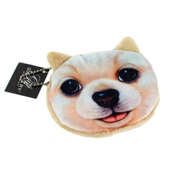 A Zippered Puppy Clutch with a dog face on it.