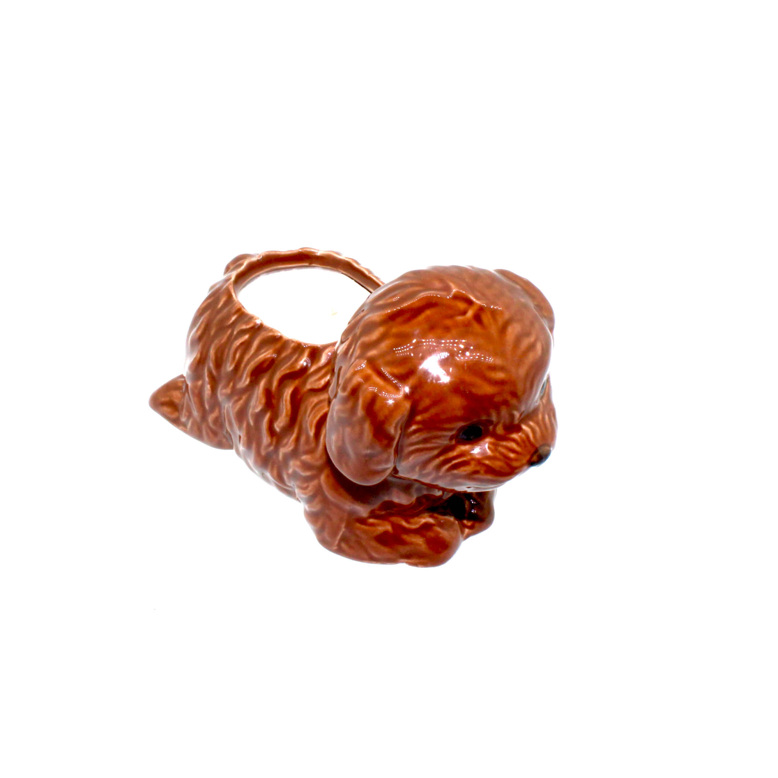 A Brown Puppy Candle holder side view with the dog pointing to the right