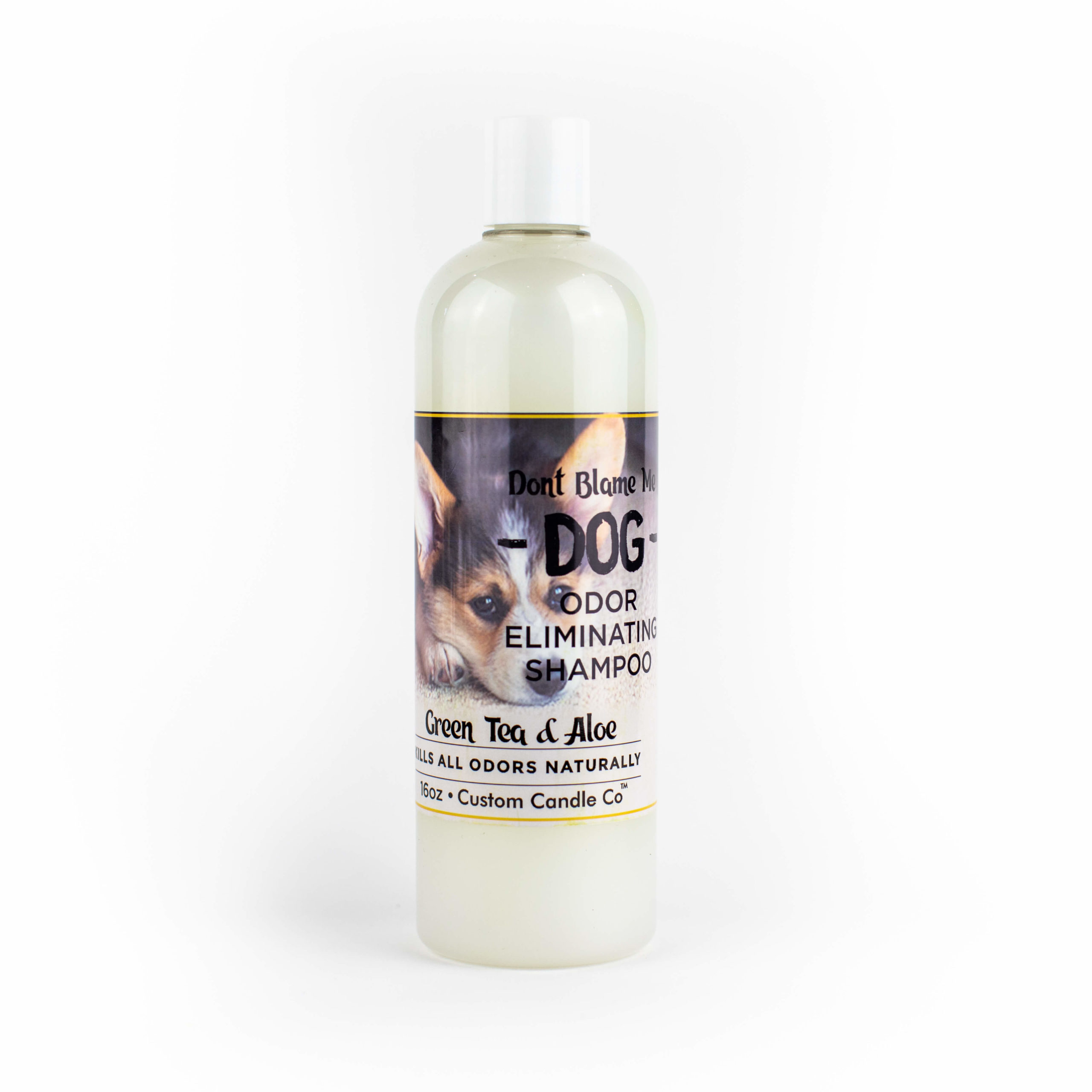 A bottle of Dog Shampoo - Green Tea Aloe 16-oz on a white background.