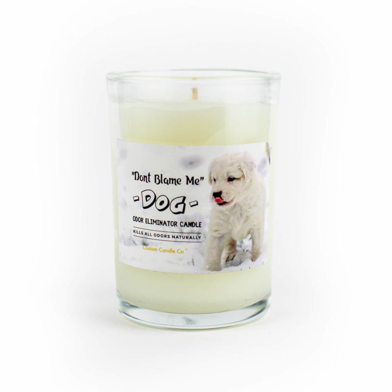 A "Don't Blame Me" small white Dog Candle Odor Eliminator with a dog on it.