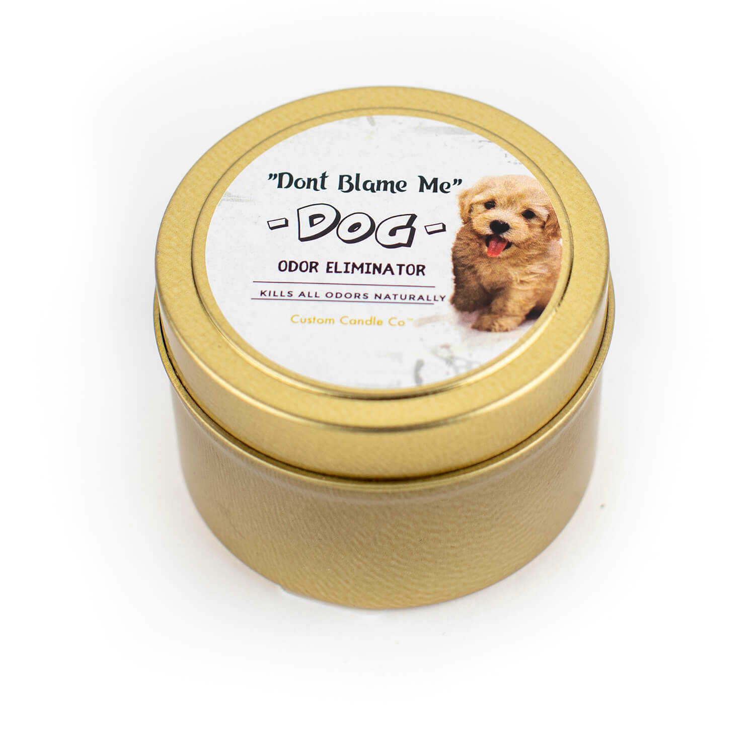 A "Don't Blame Me" Dog Tin Candle Odor Eliminator with the image of dog on it.