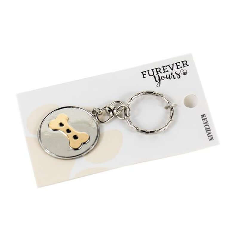 A Furever Yours: Key Chains for Dog Lovers with a dog bone on it.