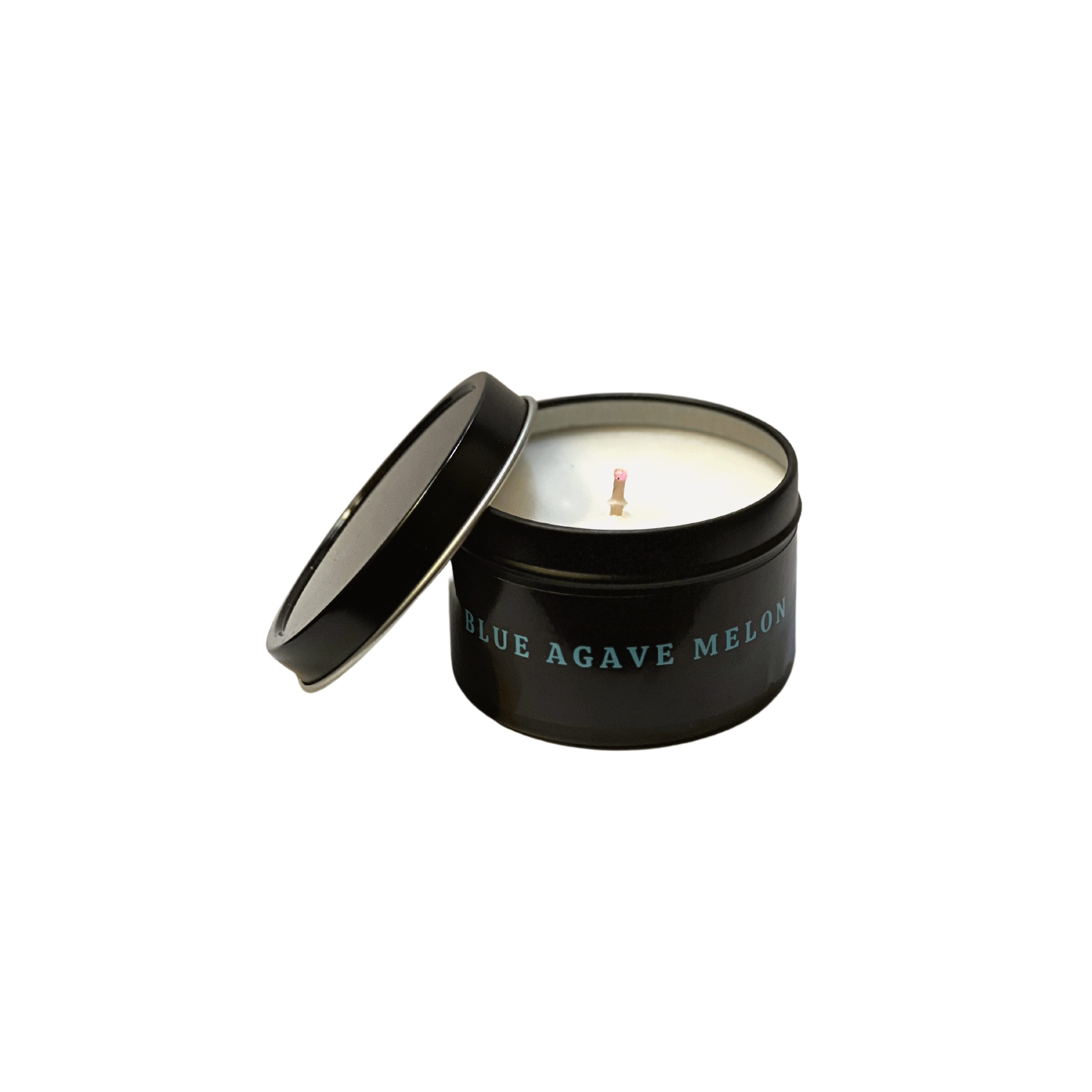 A black Travel Tins Spa Candle.