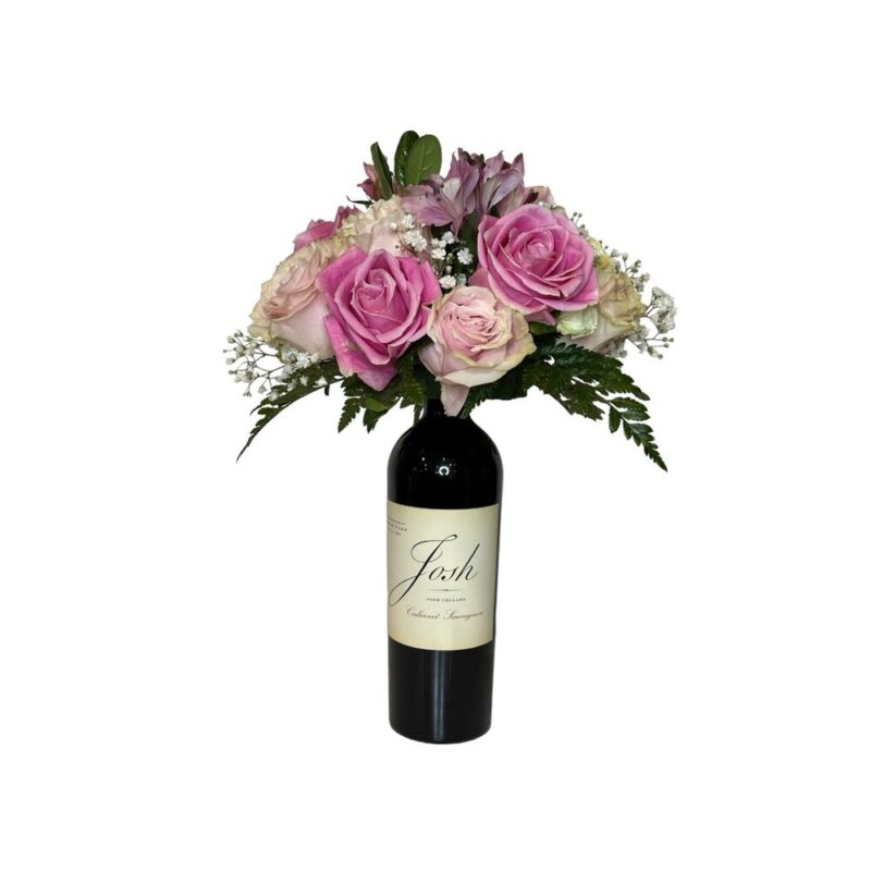A Wine and Flower in a wine bottle.